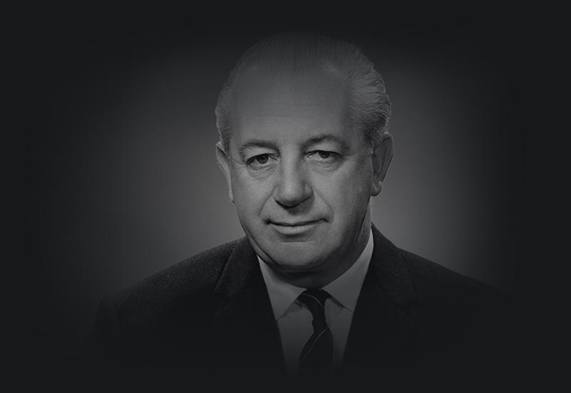 This is a black-and-white portrait of Prime Minister Harold Holt.