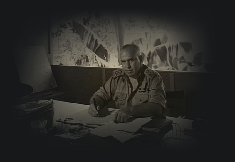 Veale at his desk in Port Moresby during WWII.