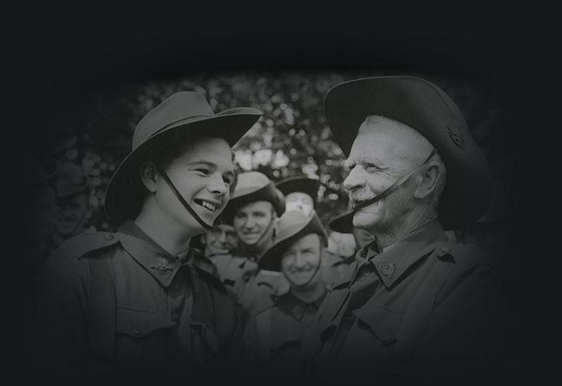 A young man and older man of the Volunteer Defence Corps in uniform wearing slouch hats.