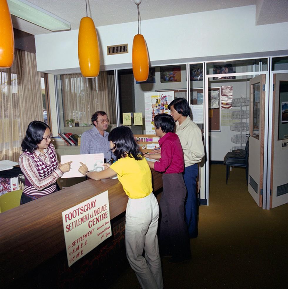This is a photograph of migrants receiving support at the International Club of Victoria.