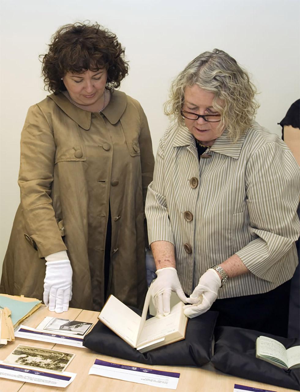 Thérèse Rein at the National Archives of Australia viewing a diary from Prime Minister Holt Series, 2009.