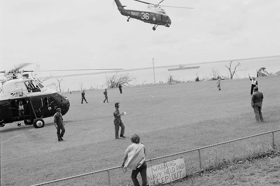 A Royal Australian Navy Wessex helicopter delivers supplies to a makeshift ‘helo pad’ in Darwin.