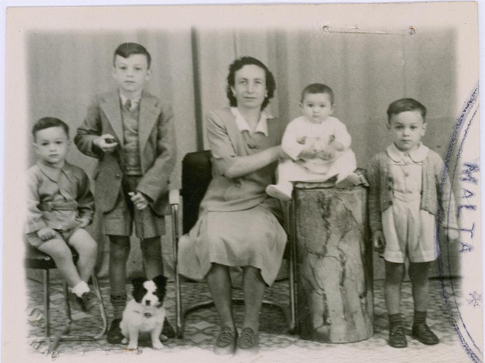 Family photograph with their pet dog.