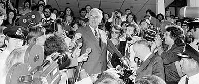 Gough Whitlam addresses the media on the front steps of Old Parliament House