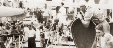 A crowd of people on the deck of the Nelly. 