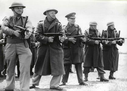 Men of the Volunteer Defence Corps armed with machine guns.