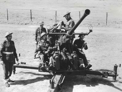 6 men of the Volunteer Defence Corps operating an anti aircraft gun.