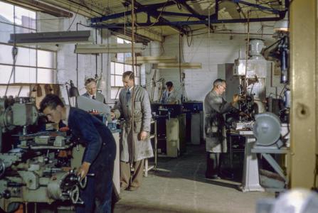 Men working in a factory. 