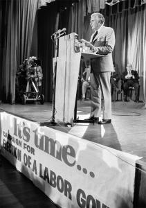 Gough Whitlam on stage during his election campaign