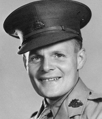 Portrait of Cliff Bottomley in military uniform.